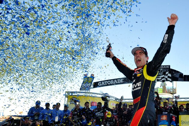 MARTINSVILLE, VA - OCTOBER 27:  Jeff Gordon, driver of the #24 Drive To End Hunger Chevrolet, celebrates in victory lane after winning the NASCAR Sprint Cup Series Goody's Headache Relief Shot 500 Powered By Kroger at Martinsville Speedway on October 27, 2013 in Martinsville, Virginia.  (Photo by Rainier Ehrhardt/Getty Images)