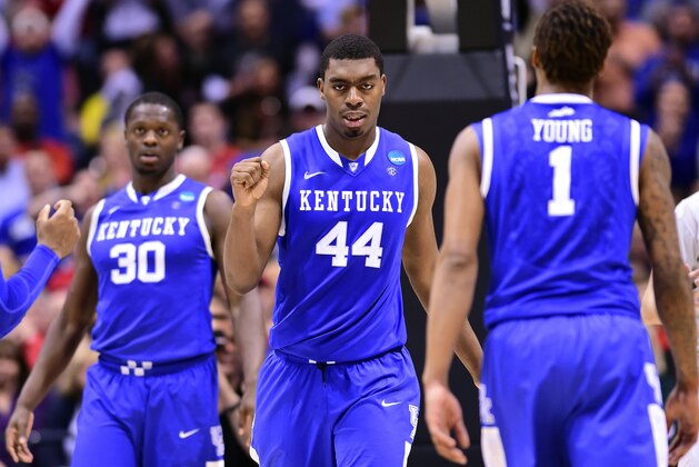 Mar 28, 2014; Indianapolis, IN, USA; Kentucky Wildcats center Dakari Johnson (44) and guard/forward James Young (1) and forward Julius Randle (30) react in the second half in the semifinals of the midwest regional of the 2014 NCAA Mens Basketball Championship tournament against the Louisville Cardinals at Lucas Oil Stadium. Mandatory Credit: Bob Donnan-USA TODAY Sports