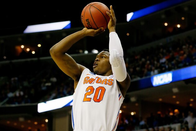 MEMPHIS, TN - MARCH 27:  Michael Frazier II #20 of the Florida Gators takes a shot against the UCLA Bruins during a regional semifinal of the 2014 NCAA Men's Basketball Tournament at the FedExForum on March 27, 2014 in Memphis, Tennessee.  (Photo by Kevin C. Cox/Getty Images)
