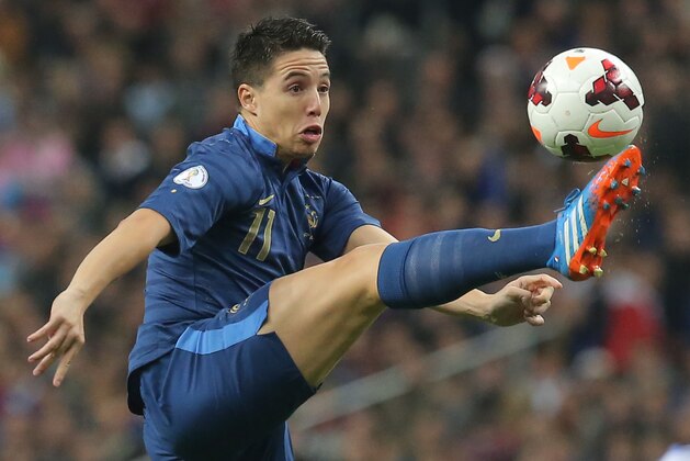 France's Samir Nasri, controls the ball during their group I World Cup qualifying soccer match between France and Finland, at the Stade de France stadium in Saint Denis, outside Paris, Tuesday, Oct. 15, 2013. (AP Photo/Michel Euler)