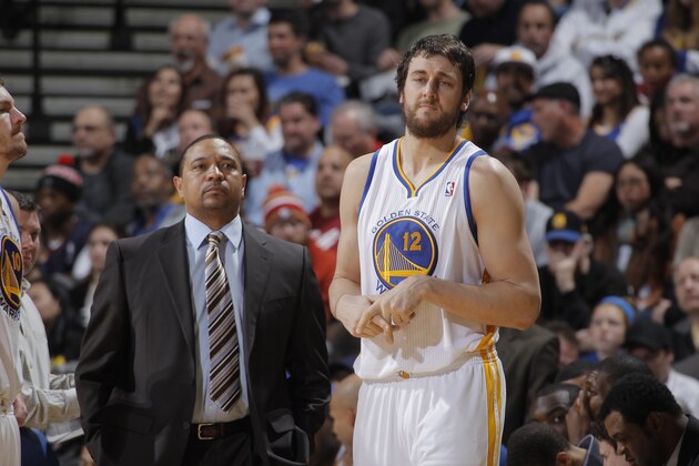 OAKLAND, CA - JANUARY 31: Head Coach Mark Jackson and Andrew Bogut #12 of the Golden State Warriors in a game against the Dallas Mavericks on January 31, 2013 at Oracle Arena in Oakland, California. NOTE TO USER: User expressly acknowledges and agrees that, by downloading and or using this photograph, user is consenting to the terms and conditions of Getty Images License Agreement. Mandatory Copyright Notice: Copyright 2013 NBAE (Photo by Rocky Widner/NBAE via Getty Images)