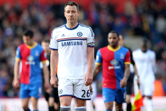 LONDON, ENGLAND - MARCH 29:  A dejected John Terry of Chelsea walks off the pitch following his team's 1-0 defeat during the Barclays Premier League match between Crystal Palace and Chelsea at Selhurst Park on March 29, 2014 in London, England.  (Photo by Scott Heavey/Getty Images)
