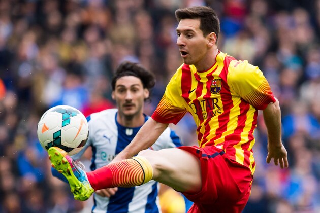BARCELONA, SPAIN - MARCH 29: Lionel Messi of FC Barcelona controls the ball during the La Liga match between RCD Espanyol and FC Barcelona at Cornella-El Prat Stadium on March 29, 2014 in Barcelona, Spain. (Photo by Alex Caparros/Getty Images)