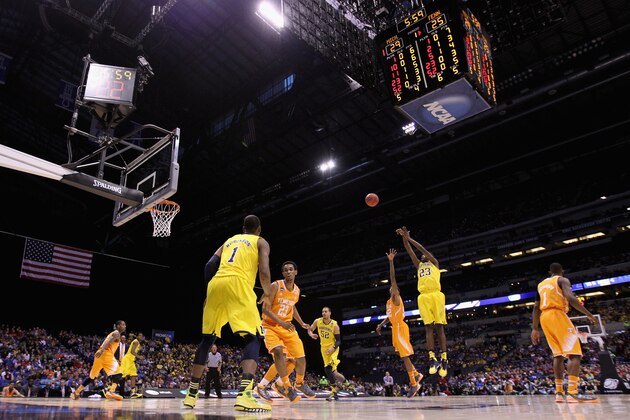INDIANAPOLIS, IN - MARCH 28:  Caris LeVert #23 of the Michigan Wolverines shoots the ball against the Tennessee Volunteers in the first half during the regional semifinal of the 2014 NCAA Men's Basketball Tournament at Lucas Oil Stadium on March 28, 2014 in Indianapolis, Indiana.  (Photo by Jonathan Daniel/Getty Images)