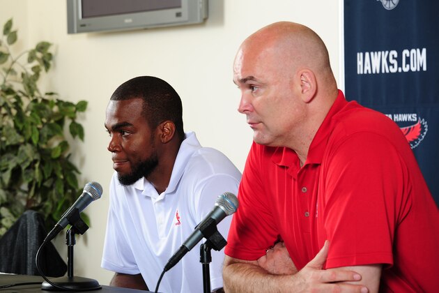 ATLANTA, GA - JULY 10: General Manager Danny Ferry of the Atlanta Hawks introduces Paul Millsap as the newest member of the Atlanta Hawks during a press conference on July 10, 2013 at Philips Arena in Atlanta, Georgia.  NOTE TO USER: User expressly acknowledges and agrees that, by downloading and/or using this Photograph, user is consenting to the terms and conditions of the Getty Images License Agreement. Mandatory Copyright Notice: Copyright 2013 NBAE (Photo by Scott Cunningham/NBAE via Getty Images)