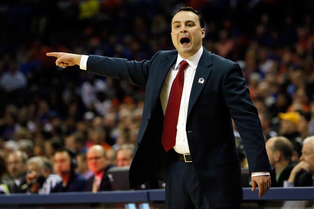 Dayton head coach Archie Miller speaks to players against Florida during the first half in a regional final game at the NCAA college basketball tournament, Saturday, March 29, 2014, in Memphis, Tenn. (AP Photo/Mark Humphrey)