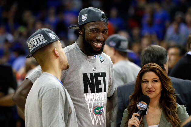 MEMPHIS, TN - MARCH 29: Patric Young #4 and Scottie Wilbekin #5 of the Florida Gators speak with broadcaster Rachel Nichols after defeating the Dayton Flyers 62-52 in the south regional final of the 2014 NCAA Men's Basketball Tournament at the FedExForum on March 29, 2014 in Memphis, Tennessee.  (Photo by Kevin C. Cox/Getty Images)