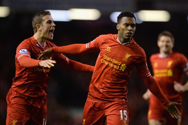 LIVERPOOL, ENGLAND - MARCH 26:  Daniel Sturridge of Liverpool celebrates scoring the second goal with team-mate Jordan Henderson (l) during the Barclays Premier League match between Liverpool and Sunderland at Anfield on March 26, 2014 in Liverpool, England.  (Photo by Michael Regan/Getty Images)