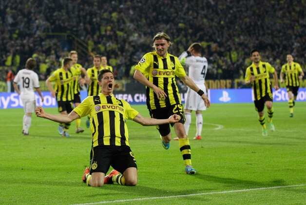 Dortmund's Robert Lewandowski, from Poland, celebrates after scoring his third goal during the Champions League semifinal first leg soccer match between Borussia Dortmund and Real Madrid in Dortmund, Germany, Wednesday, April 24 2013. (AP Photo/Frank Augstein)