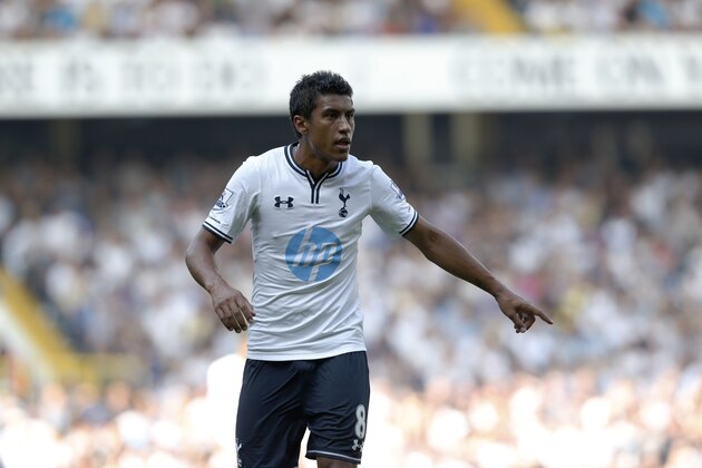 Tottenham Hotspur's Paulinho plays against Swansea City during their English Premier League soccer match at White Hart Lane, London, Sunday, Aug. 25, 2013. (AP Photo/Sang Tan)