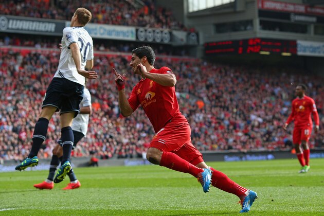 LIVERPOOL, ENGLAND - MARCH 30:  Luis Suarez of Liverpool celebrates scoring the second goal during the Barclays Premier League match between Liverpool and Tottenham Hotspur at Anfield on March 30, 2014 in Liverpool, England.  (Photo by Alex Livesey/Getty Images)