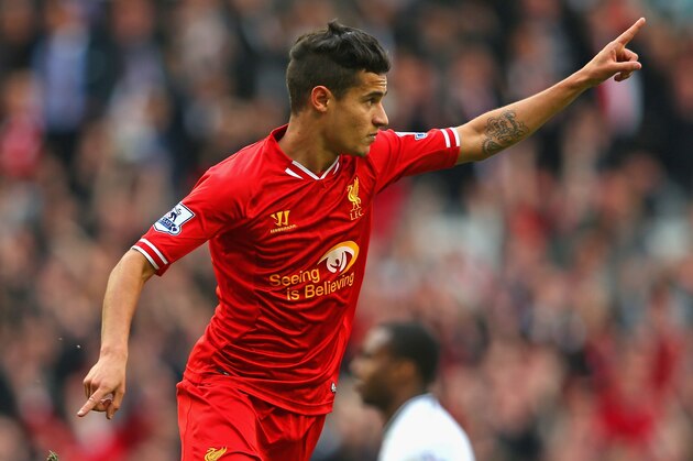 LIVERPOOL, ENGLAND - MARCH 30: Philippe Coutinho of Liverpool celebrates scoring the third goal during the Barclays Premier League match between Liverpool and Tottenham Hotspur at Anfield on March 30, 2014 in Liverpool, England. (Photo by Alex Livesey/Getty Images) LIVERPOOL, ENGLAND - MARCH 30: Philippe Coutinho of Liverpool celebrates scoring the third goal during the Barclays Premier League match between Liverpool and Tottenham Hotspur at Anfield on March 30, 2014 in Liverpool, England. (Photo by Alex Livesey/Getty Images)