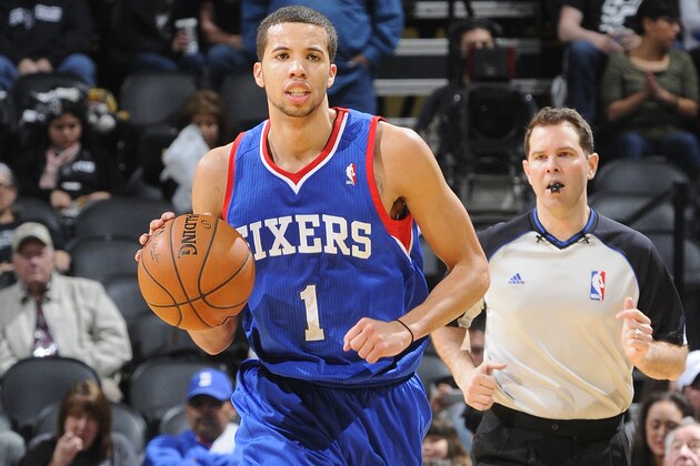 SAN ANTONIO, TX - March 24: Michael Carter-Williams of the Philadelphia 76ers handles the ball against the San Antonio Spurs at the AT&T Center on March 24, 2014 in San Antonio, Texas. NOTE TO USER: User expressly acknowledges and agrees that, by downloading and or using this photograph, user is consenting to the terms and conditions of the Getty Images License Agreement. Mandatory Copyright Notice: Copyright 2014 NBAE (Photos by D. Clarke Evans/NBAE via Getty Images)