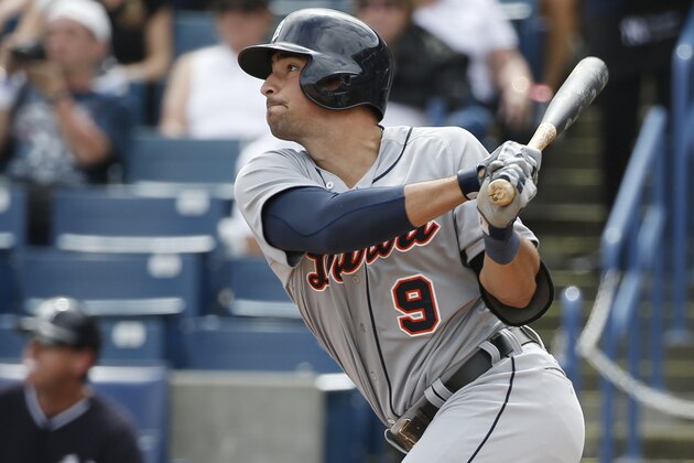 Detroit Tigers  Nick Castellanos (9) hits a first-inning, RBI double off New York Yankees starting pitcher Hiroki Kuroda in a spring exhibition baseball game in Tampa, Fla., Wednesday, March 12, 2014. Alex Avila scored on the play. (AP Photo/Kathy Willens)