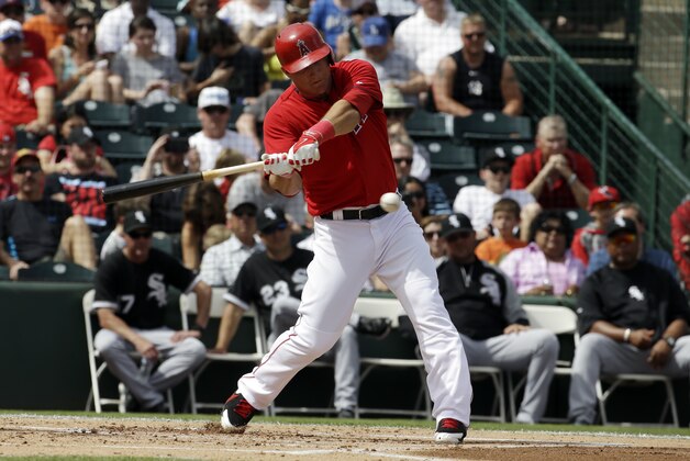 Los Angeles Angels's Mike Trout hits during an exhibition spring training baseball game against the Chicago White Sox Thursday, March 13, 2014, in Tempe, Ariz. (AP Photo/Morry Gash)