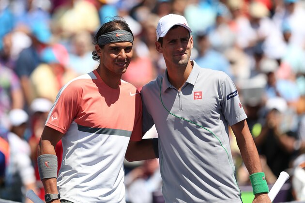KEY BISCAYNE, FL - MARCH 30:  Rafael Nadal of Spain and Novak Djokovic of Serbia pose for a photograph before their final match during day 14 at the Sony Open at Crandon Park Tennis Cente on March 30, 2014 in Key Biscayne, Florida.  (Photo by Clive Brunskill/Getty Images)