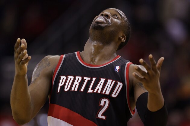 Portland Trail Blazers' Wesley Matthews (2) looks up at the scoreboard after being called for a foul against the Houston Rockets during the fourth quarter of an NBA basketball game Sunday, March 9, 2014, in Houston. The Rockets won in overtime 118-113. (AP Photo/David J. Phillip)