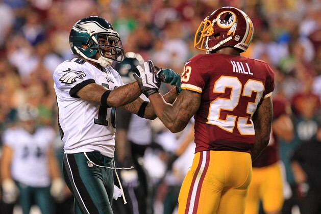 Sep 9, 2013; Landover, MD, USA; Philadelphia Eagles wide receiver DeSean Jackson (10) and Washington Redskins cornerback DeAngelo Hall (23) exchange words in the second quarter at FedEx Field. The Eagles won 33-27. Mandatory Credit: Geoff Burke-USA TODAY Sports
