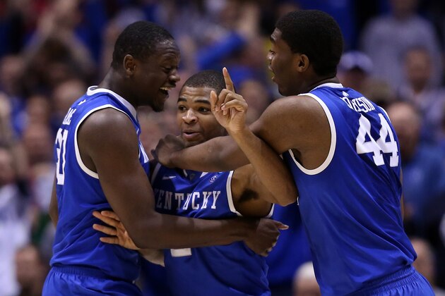 INDIANAPOLIS, IN - MARCH 30: Aaron Harrison #2 of the Kentucky Wildcats celebrates with teammates Julius Randle #30 and Dakari Johnson #44 after defeating the Michigan Wolverines 75 to 72 in the midwest regional final of the 2014 NCAA Men's Basketball Tournament at Lucas Oil Stadium on March 30, 2014 in Indianapolis, Indiana. (Photo by Jonathan Daniel/Getty Images) INDIANAPOLIS, IN - MARCH 30: Aaron Harrison #2 of the Kentucky Wildcats celebrates with teammates Julius Randle #30 and Dakari Johnson #44 after defeating the Michigan Wolverines 75 to 72 in the midwest regional final of the 2014 NCAA Men's Basketball Tournament at Lucas Oil Stadium on March 30, 2014 in Indianapolis, Indiana. (Photo by Jonathan Daniel/Getty Images)