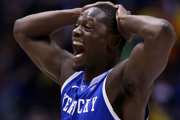INDIANAPOLIS, IN - MARCH 30:  Julius Randle #30 of the Kentucky Wildcats celebrates after defeating the Michigan Wolverines 75 to 72 in the midwest regional final of the 2014 NCAA Men's Basketball Tournament at Lucas Oil Stadium on March 30, 2014 in Indianapolis, Indiana.  (Photo by Jonathan Daniel/Getty Images)