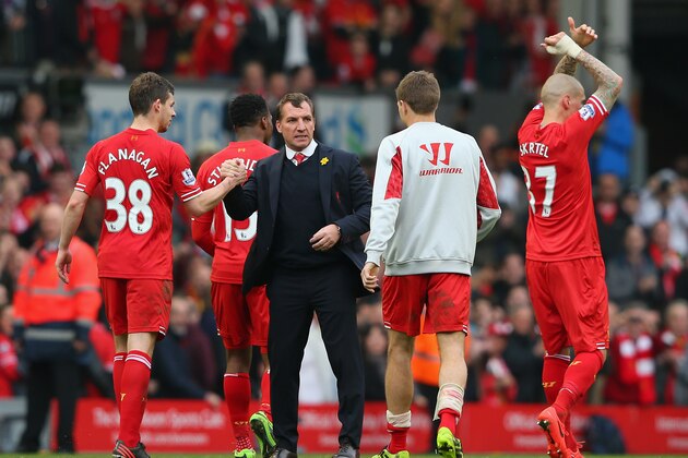 LIVERPOOL, ENGLAND - MARCH 30:  Liverpool Manager Brendan Rodgers congratulates Jon Flanagan and Steven Gerrard of Liverpool at the end of the Barclays Premier League match between Liverpool and Tottenham Hotspur at Anfield on March 30, 2014 in Liverpool, England.  (Photo by Alex Livesey/Getty Images)
