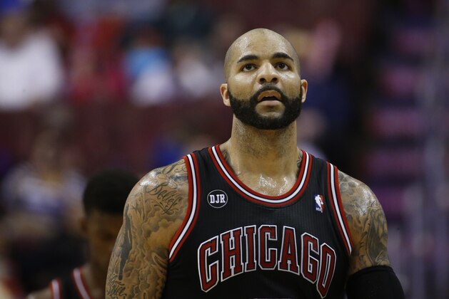 Chicago Bulls' Carlos Boozer in action during an NBA basketball game against the Philadelphia 76ers, Wednesday, March 19, 2014, in Philadelphia. (AP Photo/Matt Slocum)