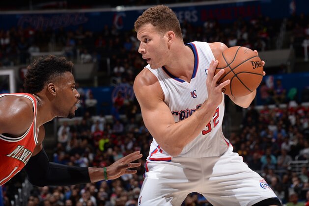 LOS ANGELES, CA - MARCH 24: Blake Griffin #32 of the Los Angeles Clippers handles the basketball against Jeff Adrien #12 of the Milwaukee Bucks at STAPLES Center on March 24, 2014 in Los Angeles, California. NOTE TO USER: User expressly acknowledges and agrees that, by downloading and/or using this Photograph, user is consenting to the terms and conditions of the Getty Images License Agreement. Mandatory Copyright Notice: Copyright 2014 NBAE (Photo by Andrew D. Bernstein/NBAE via Getty Images)