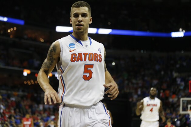 Florida guard Scottie Wilbekin (5) runs off the court against Dayton during the first half in a regional final game at the NCAA college basketball tournament, Saturday, March 29, 2014, in Memphis, Tenn. (AP Photo/John Bazemore) Florida guard Scottie Wilbekin (5) runs off the court against Dayton during the first half in a regional final game at the NCAA college basketball tournament, Saturday, March 29, 2014, in Memphis, Tenn. (AP Photo/John Bazemore)