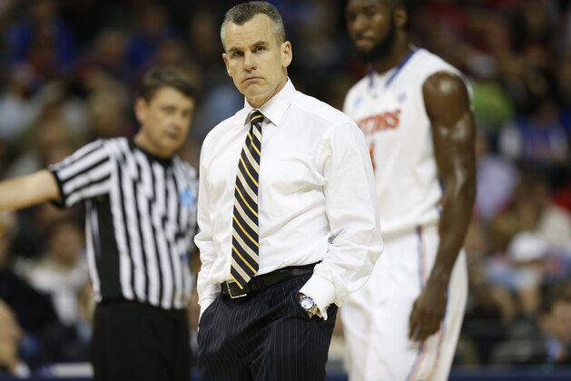 Florida head coach Billy Donovan, watches play against Dayton during the first half in a regional final game at the NCAA college basketball tournament, Saturday, March 29, 2014, in Memphis, Tenn. (AP Photo/John Bazemore)