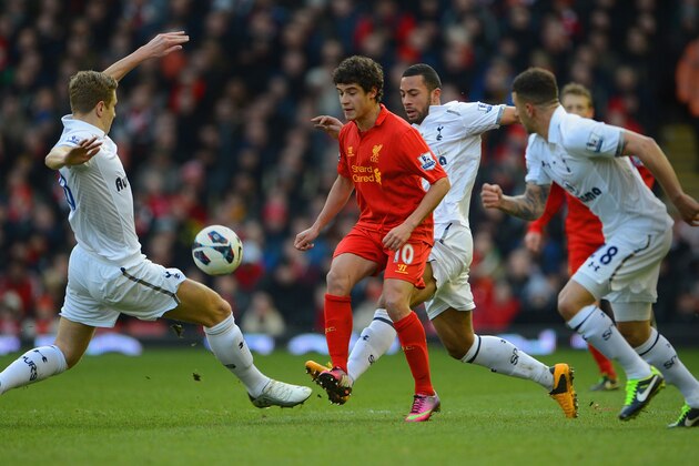 LIVERPOOL, ENGLAND - MARCH 10: Philippe Coutinho of Liverpool in action with Michael Dawson, Mousa Dembele and Kyle Walker of Tottenham during the Barclays Premier League match between Liverpool and Tottenham Hotspurs at Anfield on March 10, 2013 in Liverpool, England. (Photo by Michael Regan/Getty Images) LIVERPOOL, ENGLAND - MARCH 10: Philippe Coutinho of Liverpool in action with Michael Dawson, Mousa Dembele and Kyle Walker of Tottenham during the Barclays Premier League match between Liverpool and Tottenham Hotspurs at Anfield on March 10, 2013 in Liverpool, England. (Photo by Michael Regan/Getty Images)