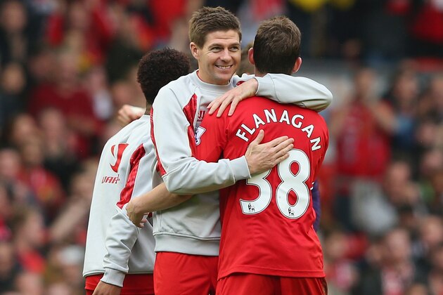 LIVERPOOL, ENGLAND - MARCH 30: Jon Flanagan is embraced by Steven Gerrard of Liverpool at the end of the Barclays Premier League match between Liverpool and Tottenham Hotspur at Anfield on March 30, 2014 in Liverpool, England. (Photo by Alex Livesey/Getty Images) LIVERPOOL, ENGLAND - MARCH 30: Jon Flanagan is embraced by Steven Gerrard of Liverpool at the end of the Barclays Premier League match between Liverpool and Tottenham Hotspur at Anfield on March 30, 2014 in Liverpool, England. (Photo by Alex Livesey/Getty Images)
