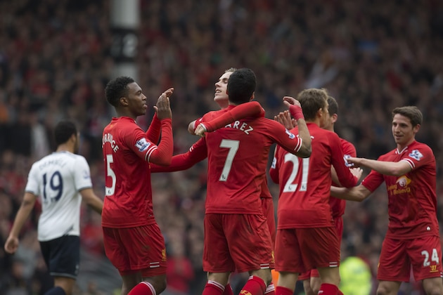 Liverpool's Jordan Henderson, center left, celebrates with teammates after scoring against Tottenham during their English Premier League soccer match at Anfield Stadium, Liverpool, England, Sunday, March 30, 2014. (AP Photo/Jon Super) Liverpool's Jordan Henderson, center left, celebrates with teammates after scoring against Tottenham during their English Premier League soccer match at Anfield Stadium, Liverpool, England, Sunday, March 30, 2014. (AP Photo/Jon Super)
