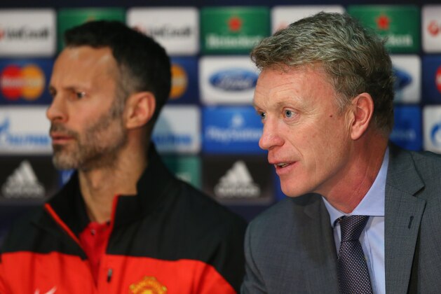 MANCHESTER, ENGLAND - MARCH 31:  David Moyes the manager of Manchester United and Ryan Giggs face the media during a press conference at Old Trafford on March 31, 2014 in Manchester, England.  (Photo by Alex Livesey/Getty Images)