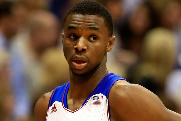 LAWRENCE, KS - NOVEMBER 22:  Andrew Wiggins #22 of the Kansas Jayhawks in action during the game against the Towson Tigers at Allen Fieldhouse on November 22, 2013 in Lawrence, Kansas.  (Photo by Jamie Squire/Getty Images)
