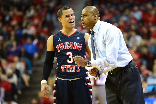 LAS VEGAS, NV - JANUARY 25:  Cezar Guerrero #3 of the Fresno State Bulldogs talks with head coach Rodney Terry during their game against the UNLV Rebels at the Thomas & Mack Center on January 25, 2014 in Las Vegas, Nevada. UNLV won 75-73 in overtime.  (Photo by Ethan Miller/Getty Images)