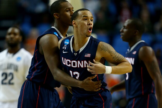 BUFFALO, NY - MARCH 22: Shabazz Napier #13 of the Connecticut Huskies reacts against the Villanova Wildcats during the third round of the 2014 NCAA Men's Basketball Tournament at the First Niagara Center on March 22, 2014 in Buffalo, New York.  (Photo by Elsa/Getty Images)