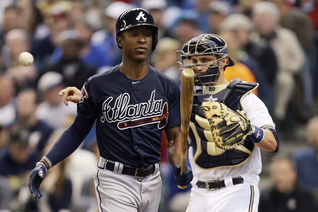 MILWAUKEE, WI - MARCH 31: B.J. Upton #2 of the Atlanta Braves walks to the dugout after striking out in the top of the third inning against the Milwaukee Brewers during Opening Day at Miller Park on March 31, 2014 in Milwaukee, Wisconsin. (Photo by Mike McGinnis/Getty Images)
