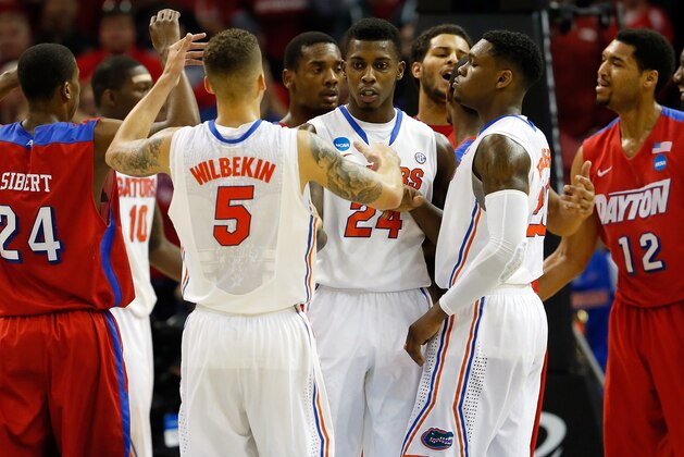 MEMPHIS, TN - MARCH 29: Scottie Wilbekin #5 celebrates with Casey Prather #24 of the Florida Gators against the Dayton Flyers during the south regional final of the 2014 NCAA Men's Basketball Tournament at the FedExForum on March 29, 2014 in Memphis, Tennessee.  (Photo by Kevin C. Cox/Getty Images)