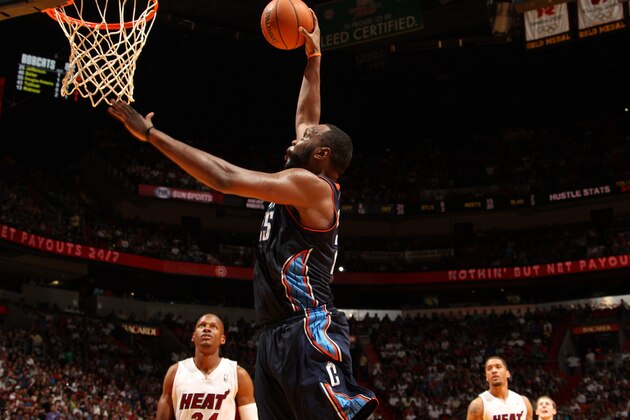 MIAMI, FL - MARCH 3:  Al Jefferson #25 of the Charlotte Bobcats drives to the basket against the Miami Heat at the American Airlines Arena in Miami, Florida on Mar. 3, 2014. NOTE TO USER: User expressly acknowledges and agrees that, by downloading and/or using this photograph, user is consenting to the terms and conditions of the Getty Images License Agreement. Mandatory copyright notice: Copyright NBAE 2014 (Photo by Issac Baldizon/NBAE via Getty Images)