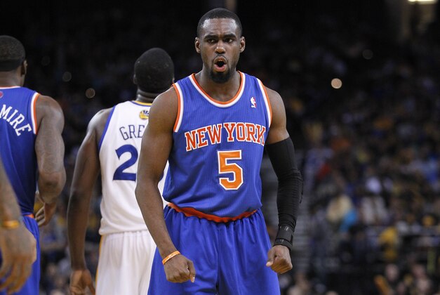 Mar 30, 2014; Oakland, CA, USA; New York Knicks guard Tim Hardaway Jr. (5) reacts against the Golden State Warriors in the fourth quarter at Oracle Arena. The Knicks won 89-84. Mandatory Credit: Cary Edmondson-USA TODAY Sports