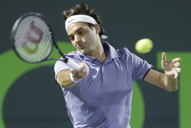 Roger Federer of Switzerland, returns a shot from Kei Nishikori of Japan, at the Sony Open Tennis tournament, Wednesday, March 26, 2014 in Key Biscayne, Fla. (AP Photo/Wilfredo Lee) Roger Federer of Switzerland, returns a shot from Kei Nishikori of Japan, at the Sony Open Tennis tournament, Wednesday, March 26, 2014 in Key Biscayne, Fla. (AP Photo/Wilfredo Lee)
