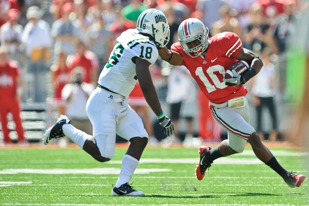 COLUMBUS, OH - SEPTEMBER 18:  Corey Brown #10 of the Ohio State Buckeyes runs with the ball as Travis Carrie #18 of the Ohio Bobcats defends at Ohio Stadium on September 18, 2010 in Columbus, Ohio.  (Photo by Jamie Sabau/Getty Images)