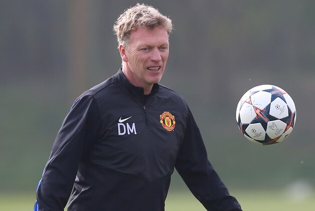 MANCHESTER, ENGLAND - MARCH 31:  David Moyes the manager of Manchester United controls the ball during a training session at the Aon Training Complex on March 31, 2014 in Manchester, England.  (Photo by Alex Livesey/Getty Images)