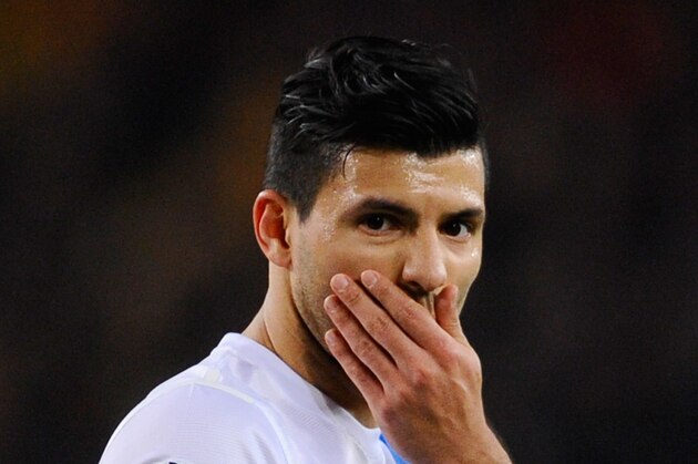 BARCELONA, SPAIN - MARCH 12:  Sergio Aguero of Manchester City reacts during the UEFA Champions League Round of 16, second leg match between FC Barcelona and Manchester City  at Camp Nou on March 12, 2014 in Barcelona, Spain.  (Photo by David Ramos/Getty Images)
