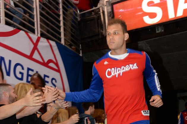 LOS ANGELES, CA - MARCH 24: Blake Griffin #32 of the Los Angeles Clippers runs out to the court before a game against the Milwaukee Bucks at STAPLES Center on March 24, 2014 in Los Angeles, California. NOTE TO USER: User expressly acknowledges and agrees that, by downloading and/or using this Photograph, user is consenting to the terms and conditions of the Getty Images License Agreement. Mandatory Copyright Notice: Copyright 2014 NBAE (Photo by Andrew D. Bernstein/NBAE via Getty Images)