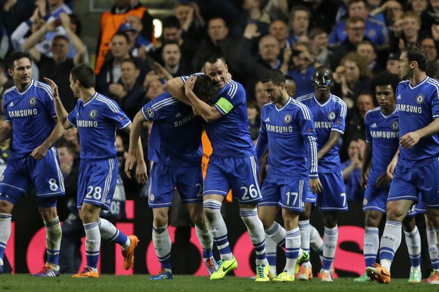 Chelsea's Gary Cahill, centre left, celebrates with John Terry after scoring his sides second goal during the Champions League round of 16 second leg soccer match between Chelsea and Galatasaray at Stamford Bridge stadium  in London Tuesday, March 18, 2014. (AP Photo/Kirsty Wigglesworth)