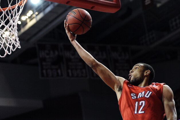 SMU's Nick Russell (12) is seen during an NCAA college basketball game against Temple on Sunday, Feb. 16, 2014, in Philadelphia. (AP Photo/Michael Perez)