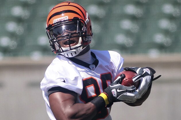 Cincinnati Bengals tight end Orson Charles (80) runs a route during practice at the NFL football team's rookie camp, Friday, May 11, 2012, at Paul Brown Stadium in Cincinnati. (AP Photo/Tony Tribble)