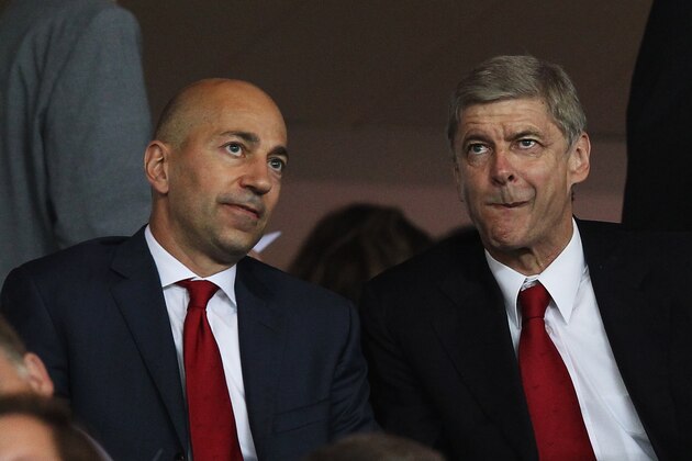 LONDON, ENGLAND - SEPTEMBER 28:  Arsene Wenger manager of Arsenal (R) and Ivan Gazidis, CEO of Arsenal (L) look on prior to the UEFA Champions League Group F match between Arsenal and Olympiacos at the Emirates Stadium on September 28, 2011 in London, England.  (Photo by Clive Rose/Getty Images)