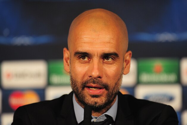 LONDON, ENGLAND - FEBRUARY 18:  FC Bayern Muenchen coach Pep Guardiola talks to the media during a press conference at the Landmark Hotel on February 18, 2014 in London, England.  (Photo by Shaun Botterill/Getty Images)